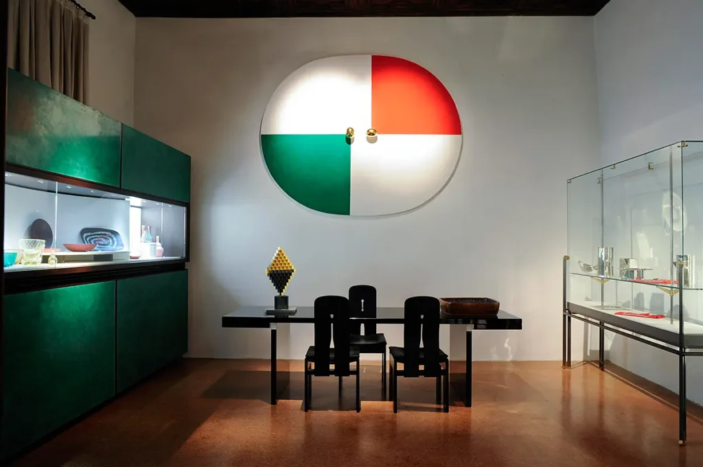 Interior space curated with Carlo Scarpa’s design influence, showcasing modern furniture and Italian-inspired wall art.