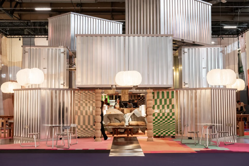 Maison & Objet Paris design showcase with sculptural chairs, geometric pendant lights, and artistic furniture pieces.