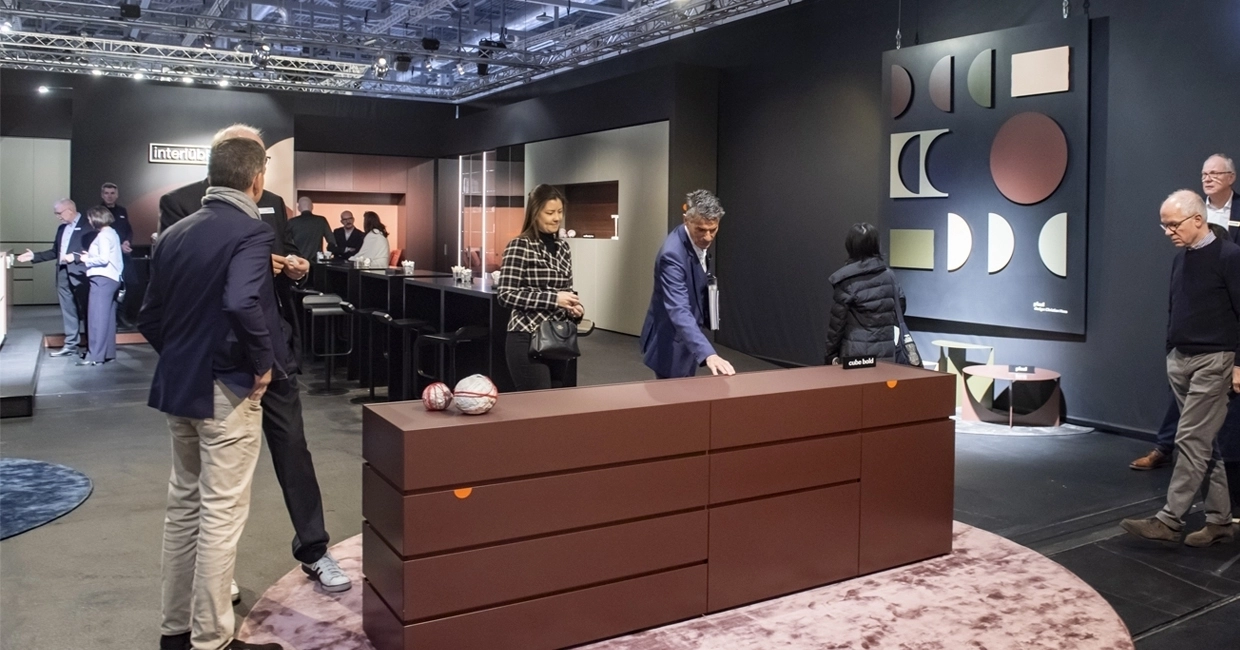 Furniture specialists acessing furniture in imm cologne