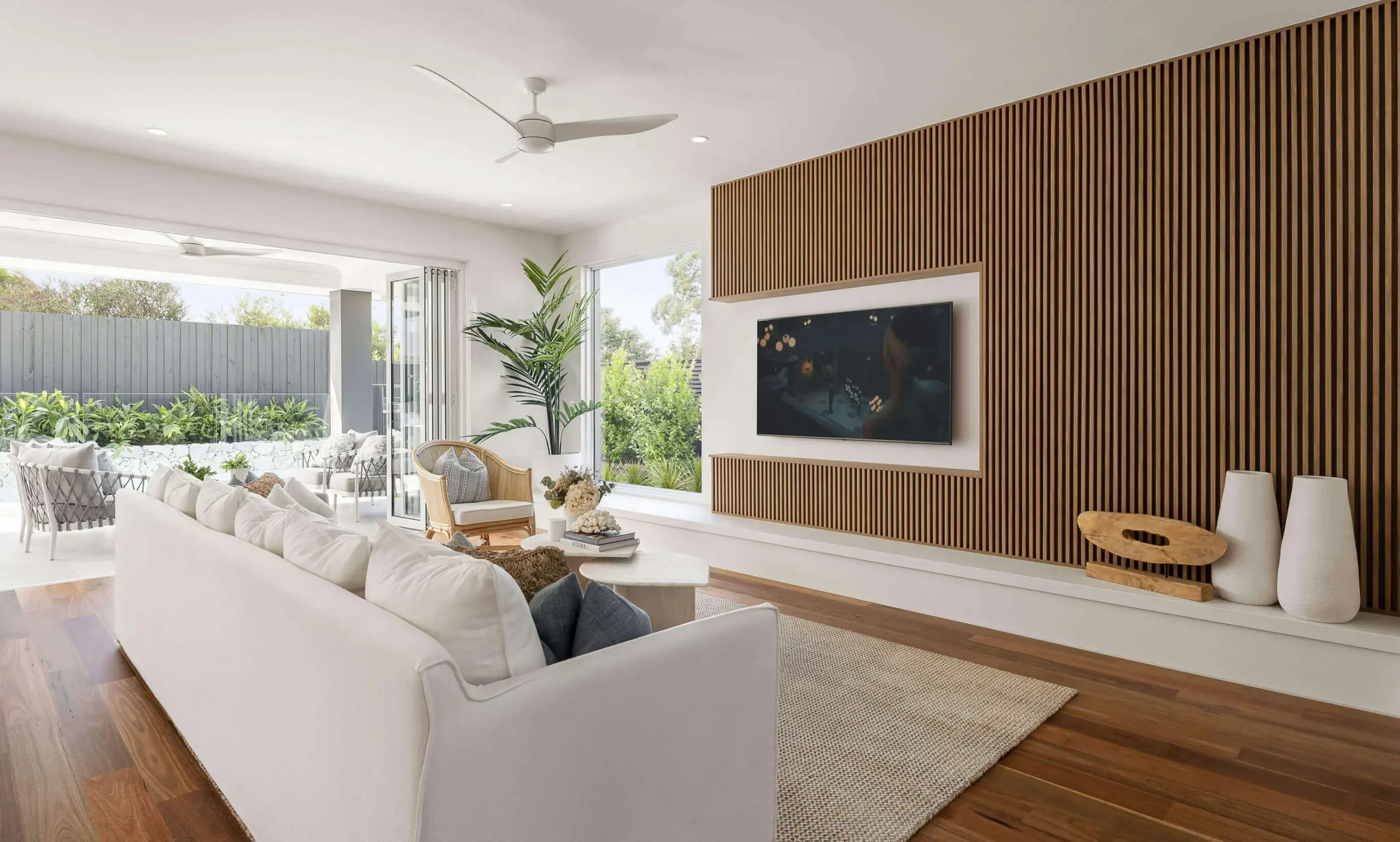 Designer Homes Featuring Iconic Custom Furniture: Coastal Retreats and Natural Materials