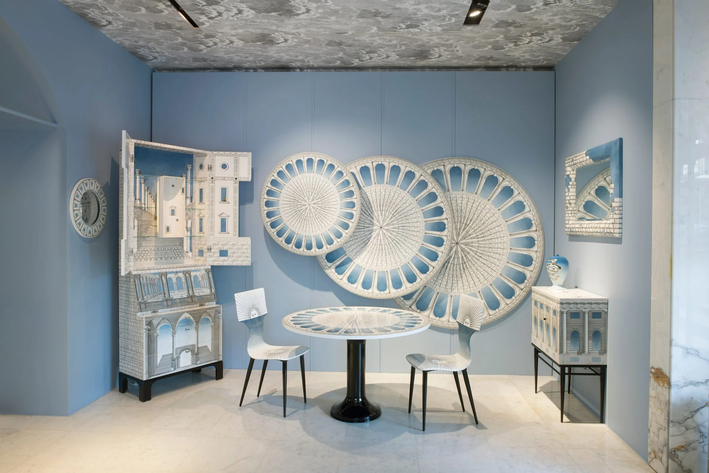 Blue tinged furniture set in a european furniture design week