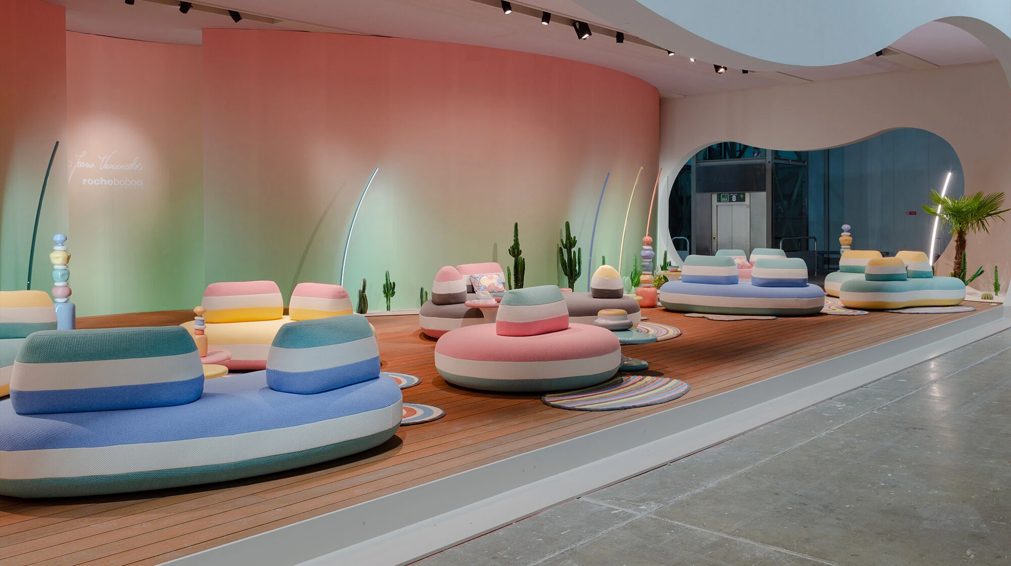 couch designs display in furniture fair in Milan.