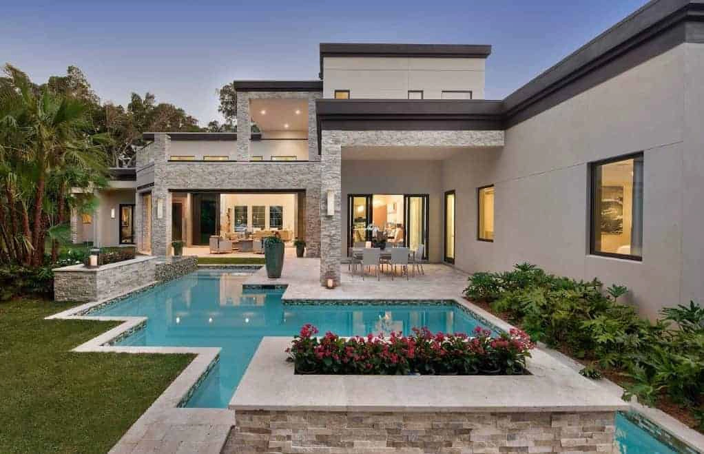 Entryway with a pool. showcasing its clear mediterranean modern style.