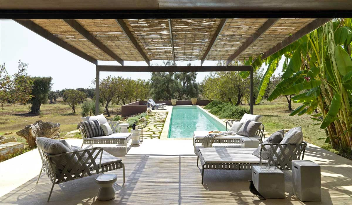 Outdoor furniture designed and rearranged to complement the modern mediterranean style.