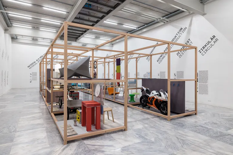 MAK exhibition view of “AUT NOW: 100 × Austrian Design for the 21st Century” during Vienna Design Week 2024, featuring contemporary Austrian furniture, objects, mobility design, and material innovation.